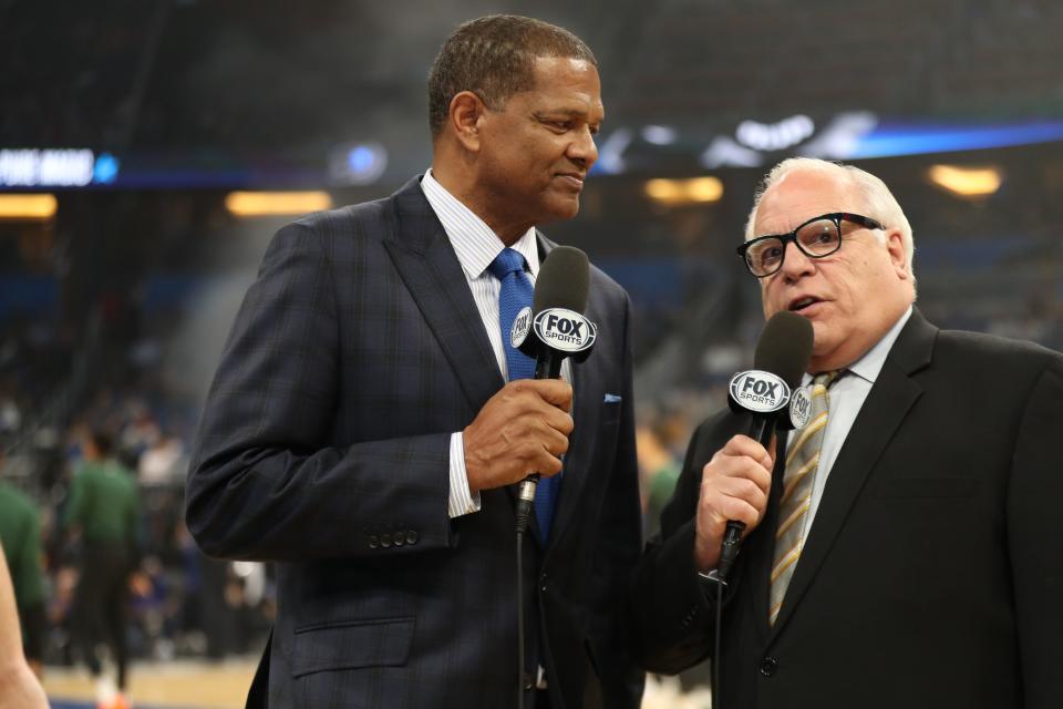 Marques Johnson (left) and Jim Paschke get set to call the Milwaukee Bucks game against the Magic in Orlando for Fox Sports Wisconsin on Saturday night.