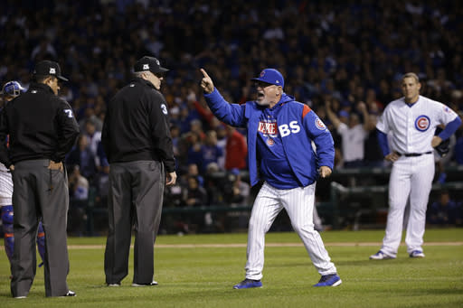 Chicago Cubs manager Joe Maddon argues with umpires during the eighth inning of Game 4 of baseball’s National League Championship Series against the Los Angeles Dodgers, Wednesday, Oct. 18, 2017, in Chicago. Maddon was ejected from the game. (AP Photo/Nam Y. Huh)