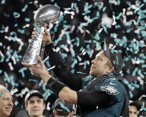 The Philadelphia Eagles’ Nick Foles holds up the Vince Lombardi Trophy after winning Super Bowl LII against the New England Patriots. (AP)