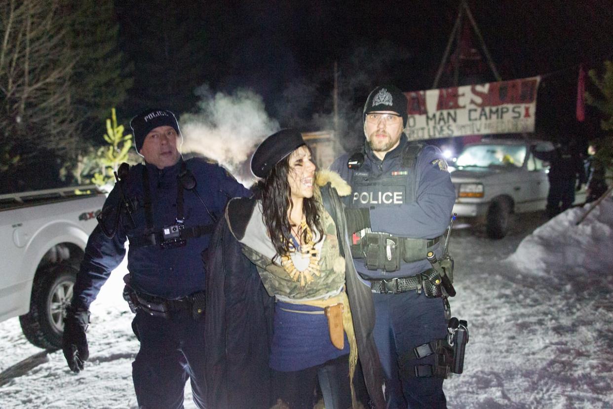 Sabina Dennis is arrested by RCMP in a February 2020 enforcement of the Coastal Gaslink pipeline injunction. (Jesse Winter/VICE - image credit)