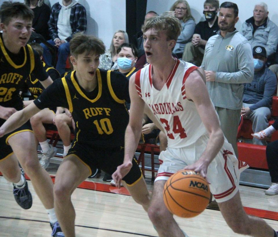 Springer's Cory Leu drives past a Roff defender. The senior tallied nine points in a 66-34 loss.