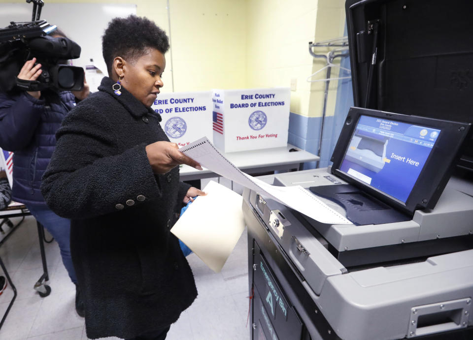 Democratic mayoral candidate India Walton votes at the Gloria J. Parks Community Center, Saturday, Oct. 30, 2021 in Buffalo, N.Y. Walton was accompanied by her four sons, three of whom voted as well. (Sharon Cantillon/The Buffalo News via AP)