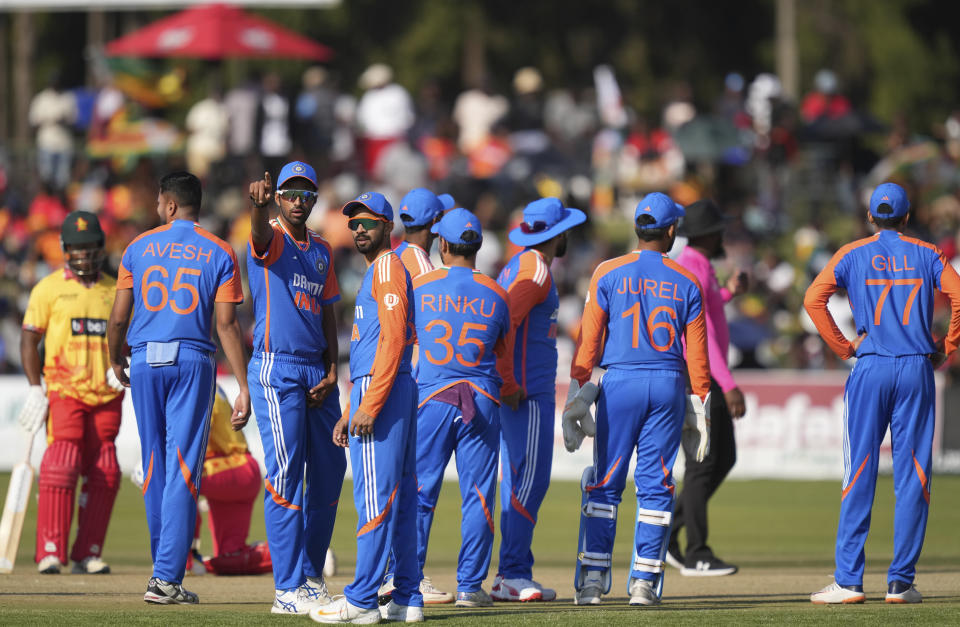 Indian players are seen on the pitch during the T20 cricket between Zimbabwe and India at Harare Sports club,Sunday, July 7,2024. (AP Photo/Tsvangirayi Mukwazhi)