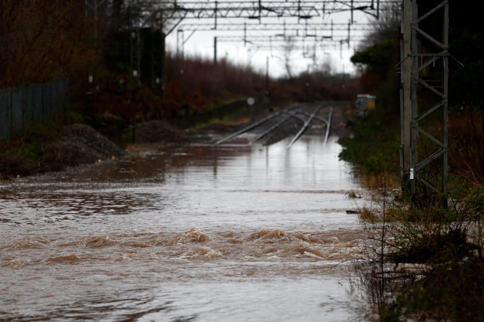 The railway line at Bowling station, West Dunbartonshire, was completely submerged (Getty)