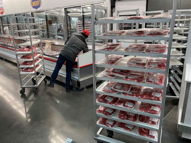 PHOTO: An employee restocks meat at a grocery store, Jan. 17, 2023, in North Miami, Fla. (Wilfredo Lee/AP, FILE)