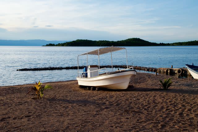 <p>YolandaVanNiekerk/Getty Images</p> On the beach of Lake Tanganyika, in Tanzania.