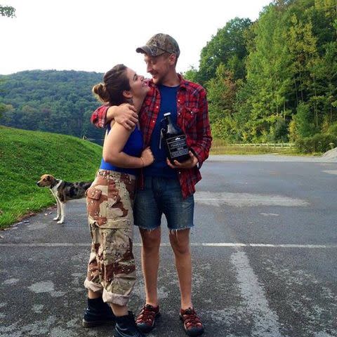 <p>Tyler Childers Instagram</p> Tyler Childers and his wife Senora May look at each other while outdoors