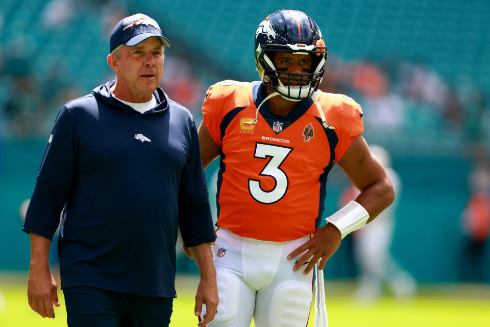 MIAMI GARDENS, FLORIDA - SEPTEMBER 24: Head coach Sean Payton of the Denver Broncos talks to Russell Wilson #3 of the Denver Broncos prior to a game against the Miami Dolphins at Hard Rock Stadium on September 24, 2023 in Miami Gardens, Florida. (Photo by Megan Briggs/Getty Images)