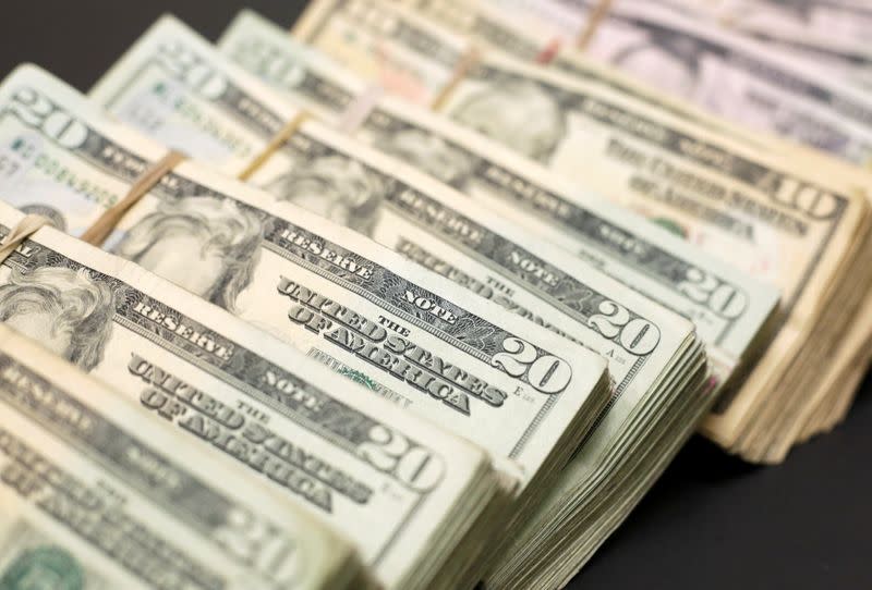 Bundles of banknotes of U.S. Dollar are pictured at a currency exchange shop in Ciudad Juarez