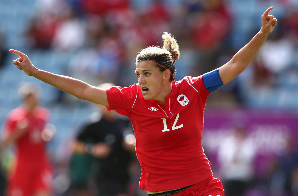 COVENTRY, ENGLAND - JULY 28: Christine Sinclair of Canada celebrates scoring a goal during the Women's Football first round Group F Match of the London 2012 Olympic Games between Canada and South Africa,>> at City of Coventry Stadium on July 28, 2012 in Coventry, England. (Photo by Quinn Rooney/Getty Images)