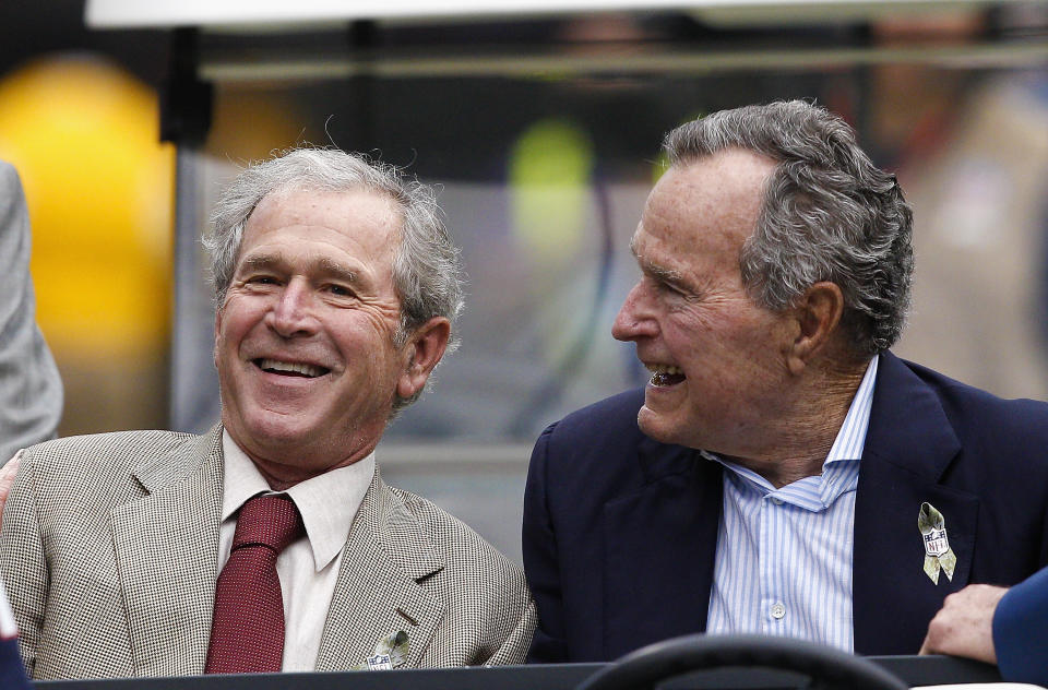 Bush Sr pictured with his son, George W Bush, who also served as the president of the US. Source: Getty