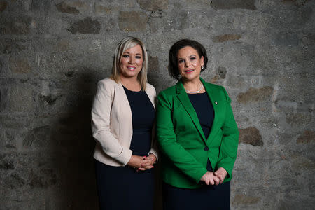 Sinn Fein's President-elect, Mary Lou McDonald and Sinn Fein Deputy Michelle O'Neill, pose for a photograph before a special party conference, at which Gerry Adams will, following a vote, formally step down as President, in Dublin, Ireland, February 10, 2018. REUTERS/Clodagh Kilcoyne