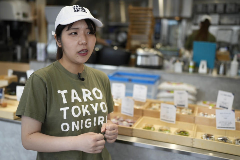 Miyuki Kawarada, chief executive of Rice Republic Inc., speaks during an interview at her Taro Tokyo Onigiri shop in Tokyo, on June 5, 2024. The word "onigiri" just became part of the Oxford English Dictionary this year. The humble sticky-rice ball, a mainstay of Japanese food, has entered the global lexicon. (AP Photo/Shuji Kajiyama)