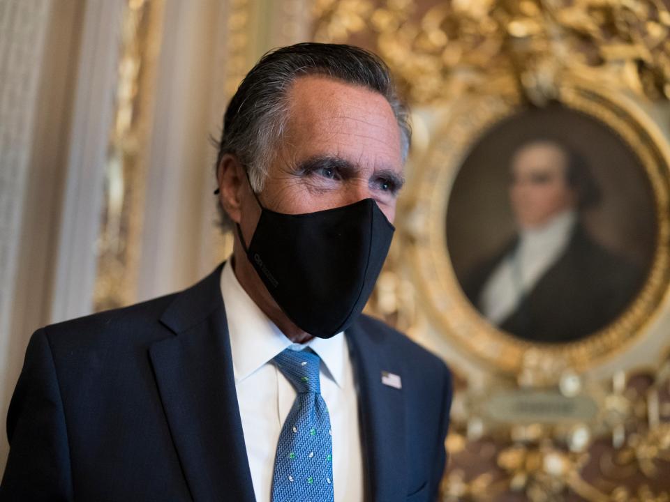 Mitt Romney, R-Utah, pauses to answer questions from reporters as senators arrive to vote on President Joe Biden’s nominee for United Nation’s ambassador, Linda Thomas-Greenfield, at the Capitol in Washington, on Tuesday 23 February 2021 ((Associated Press))