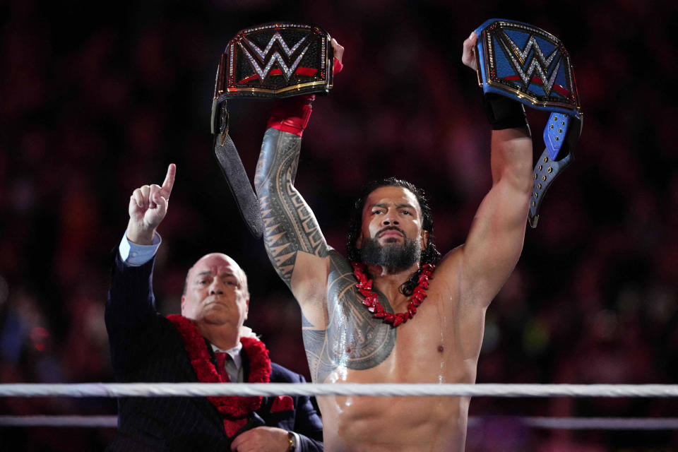 Apr 2, 2023; Inglewood, CA, USA; Paul Heyman and Roman Reigns during Wrestlemania Night 2 at SoFi Stadium. Mandatory Credit: Joe Camporeale-USA TODAY Sports