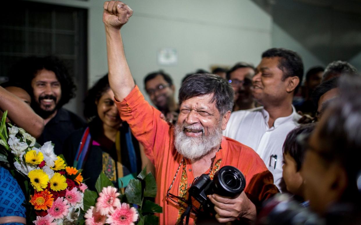 Bangladeshi photographer and activist Shahidul Alam reacts as he is released from Dhaka Central Jail - AFP