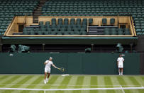 Spain's Rafael Nadal practices against Italy's Matteo Berrettini on Center Court ahead of the 2022 Wimbledon Championship at the All England Lawn Tennis and Croquet Club, in London, Thursday, June 23, 2022. (Steven Paston/PA via AP)