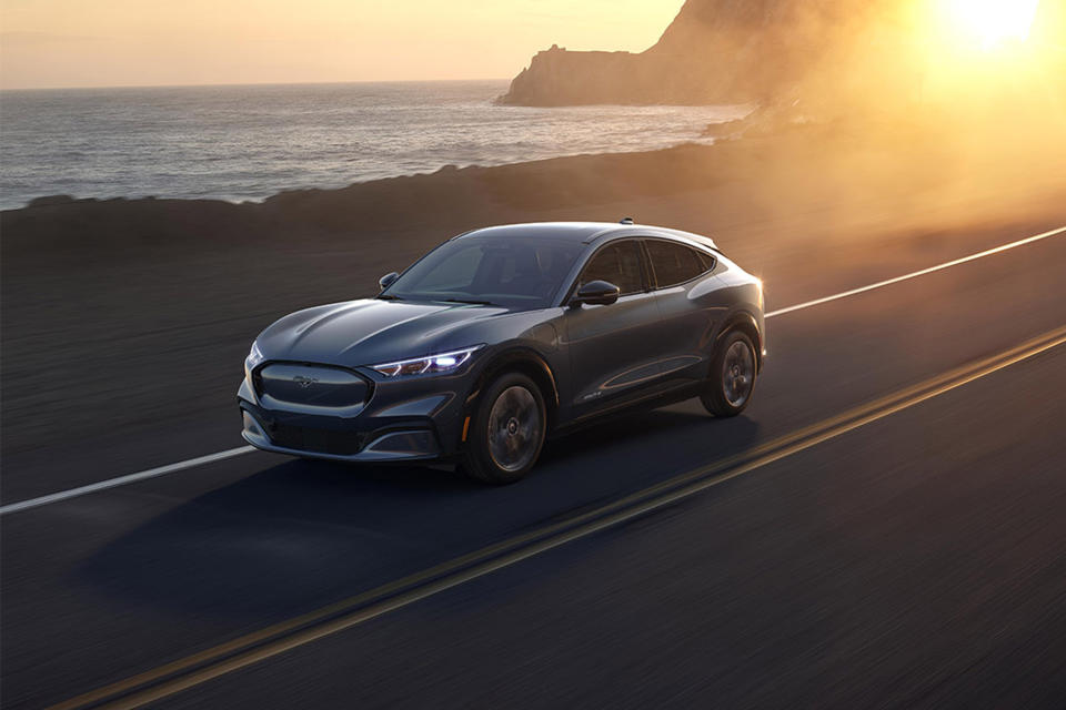 This undated photo provided by Ford shows the 2021 Mustang Mach-E, an all-electric SUV. This sleekly styled SUV's lineup ranges from a commuter-friendly long-distance configuration to a performance GT model with 459 horsepower and a 0-60 mph time of 3.5 seconds. Rear-wheel or all-wheel drive is available. (Ford Motor Co. via AP)