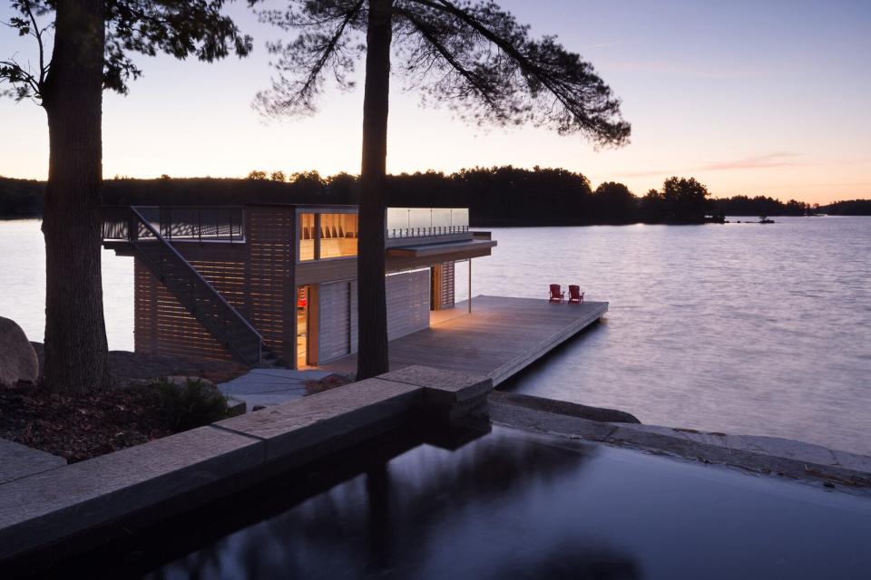 Turkel Design's team works with a local general contractor to get the structure up and running. Constructing this boathouse off site was fortuitous, since it ensured that the owners could move in by summer.