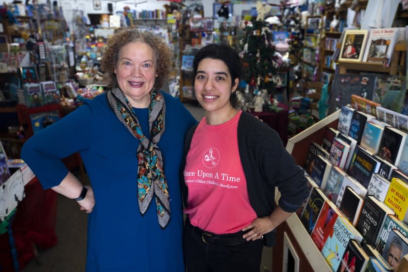 MONTROSE, CA - OCTOBER 24: Portrait of Maureen Palacios, left, owner of Once Upon a Time Bookstore with her daughter Jessica Palacios, 26, on Saturday, Oct. 24, 2020 in Montrose, CA. Once Upon a Time Bookstore in Montrose, the country's oldest children's bookstore. Now, Once Upon a Time is struggling during the coronavirus pandemic. (Francine Orr / Los Angeles Times)