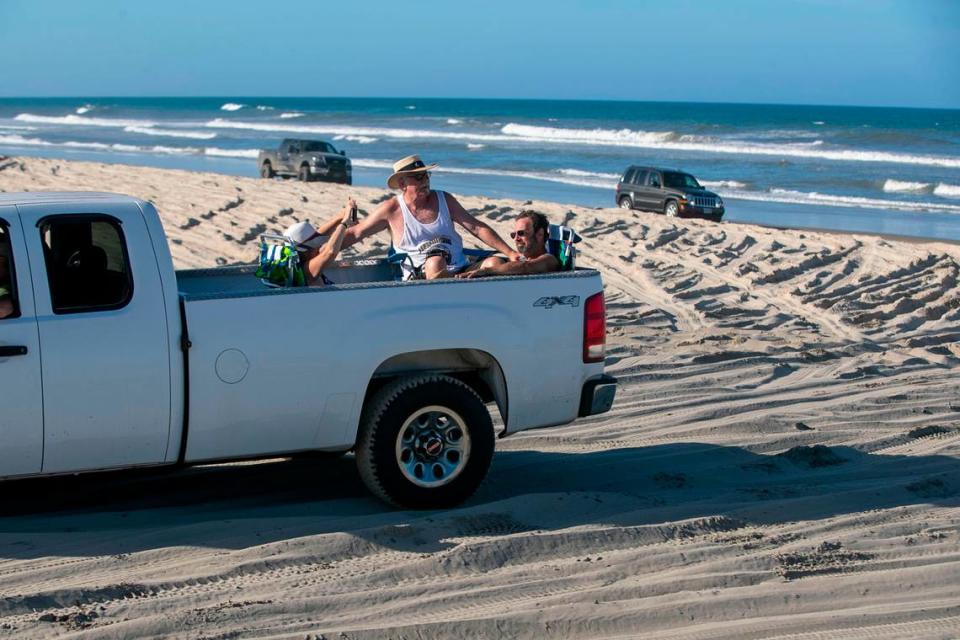 Driving on the beach is a popular attraction on the Outer Banks. Four-wheel-drive vehicles are used to access the area where NC 12 ends at its northernmost point on Monday, June 28, 2021 in Corolla, N.C. Vacationers are drawn to the area to watch the wild horses that roam the coastline.