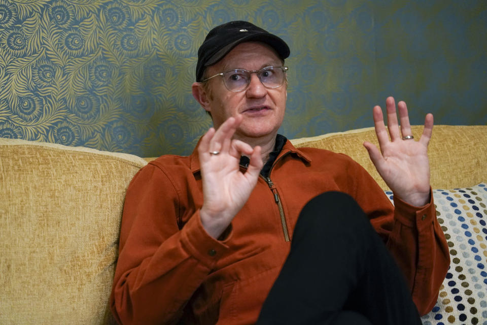 Mark Gatiss is photographed, during an interview with The Associated Press at a theater, in London, Thursday, March 14, 2024. The turbulent union of actors Richard Burton and Elizabeth Taylor that set gossip columns aflame are the subjects of “The Motive and the Cue,” a play that is being broadcast in cinemas in Britain and internationally starting Thursday as part of the National Theatre Live series. The play looks at a famous 1964 production of “Hamlet” that starred Burton and was directed by John Gielgud. Mark Gatiss plays Gielgud in the witty and moving look at fame’s fickleness and cost. (AP Photo/Alberto Pezzali)