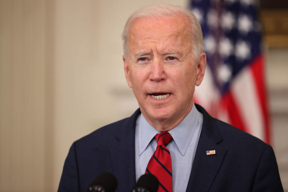 WASHINGTON, DC - MARCH 23: U.S. President Joe Biden delivers remarks about Monday's mass shooting in Boulder, Colorado, in the State Dining Room at the White House on March 23, 2021 in Washington, DC. Ten people were shot and killed at the King Soopers grocery store in Boulder and police have charged Ahmad Al Aliwi Alissa of Arvada, a suburb of Denver, with first-degree murder. This massacre comes less than a week after another mass shooting killed eight people â€” six of them women of Asian descent â€” at three spas in the Atlanta area.  (Photo by Chip Somodevilla/Getty Images)