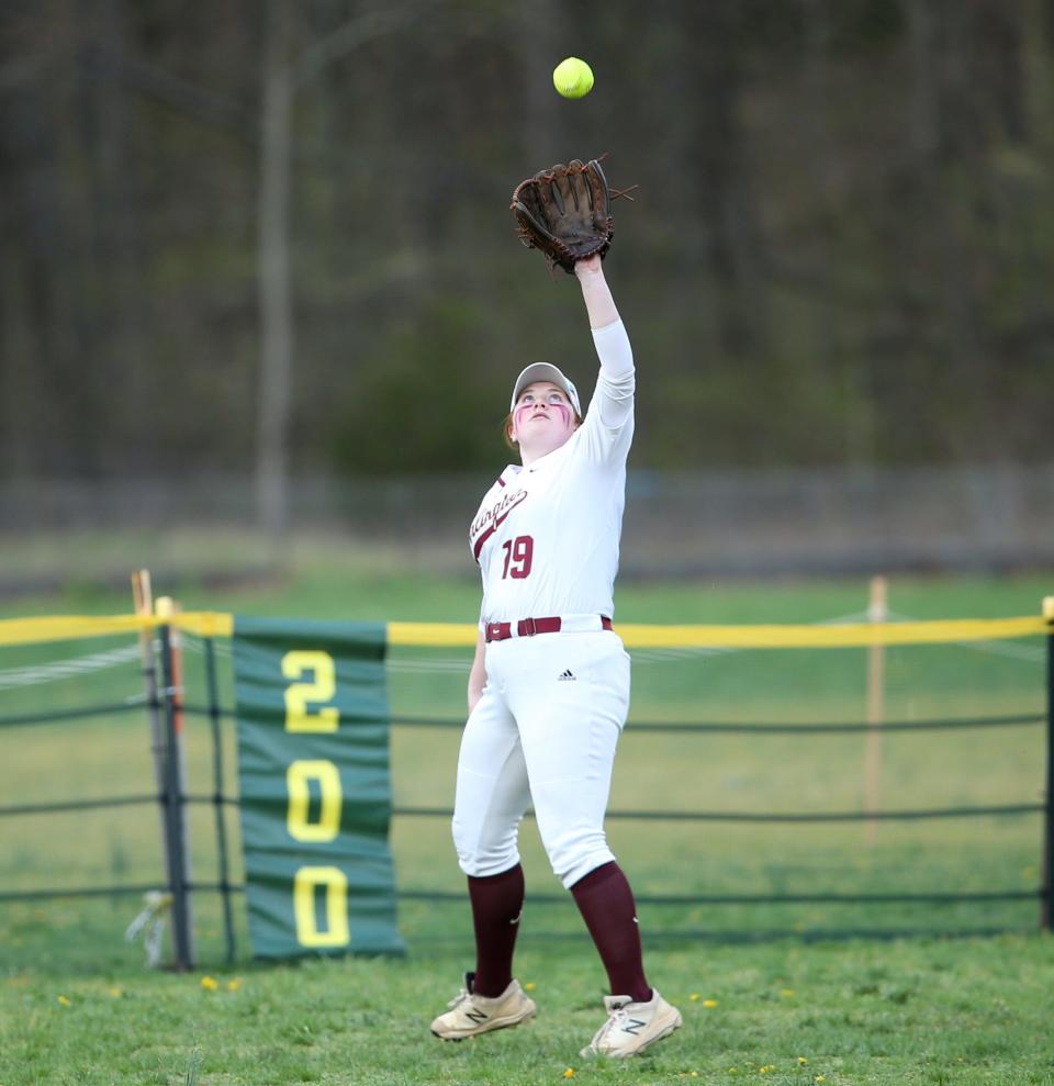 Arlington's Catherine Kelly makes a catch in center field during an April 17, 2023 softball game against John Jay-East Fishkill.