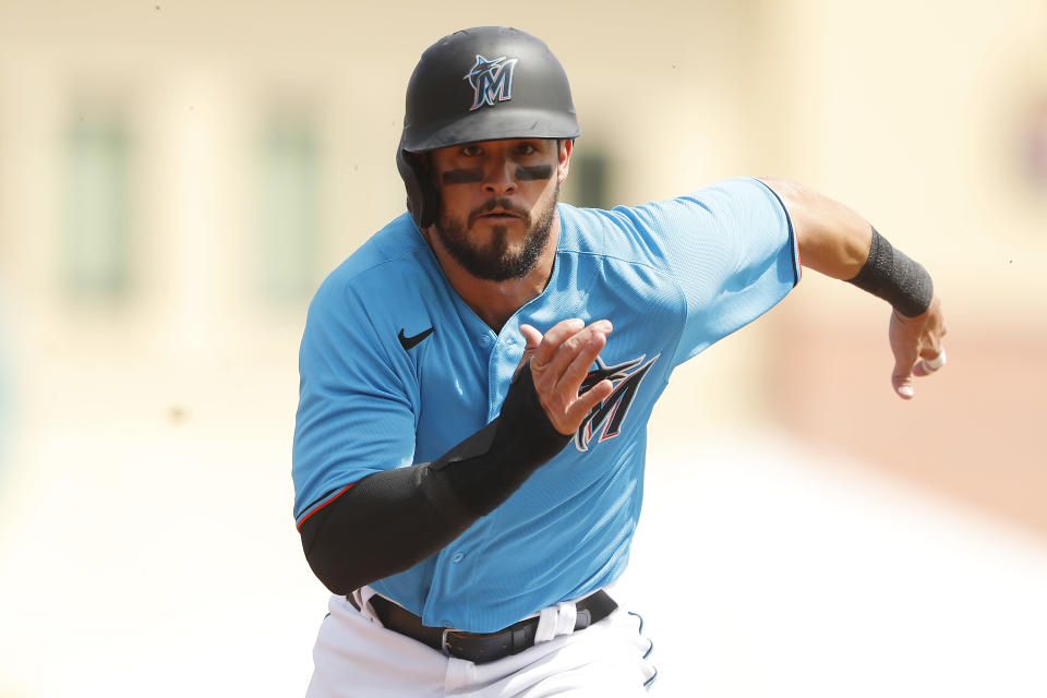 JUPITER, FLORIDA - MARCH 11:  Eddy Alvarez #65 of the Miami Marlins runs against the New York Yankees during the fifth inning of a Grapefruit League spring training at Roger Dean Stadium on March 11, 2020 in Jupiter, Florida. (Photo by Michael Reaves/Getty Images)