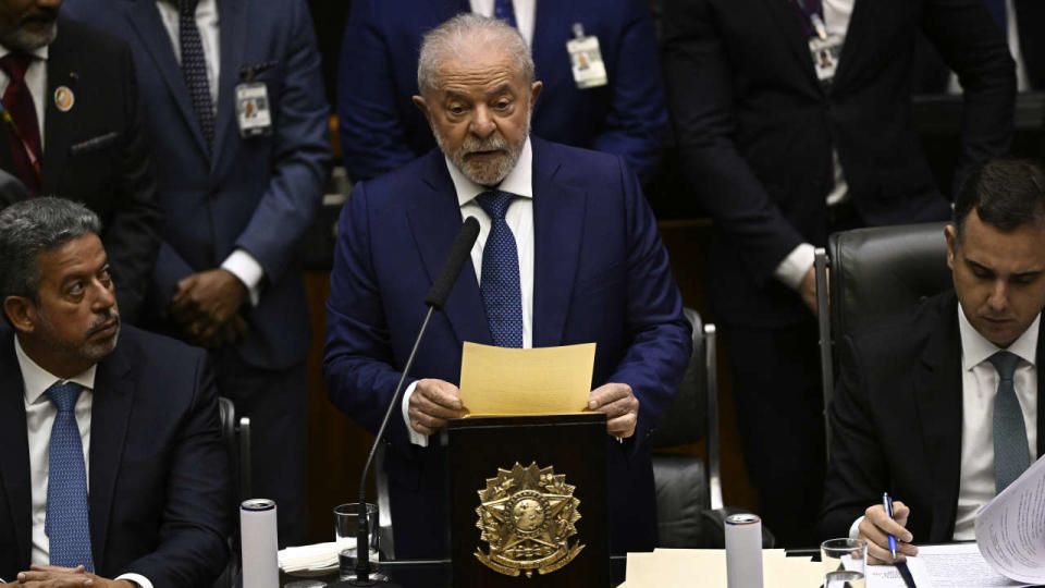 Brazil's new president Luiz Inacio Lula da Silva delivers a speech after swearing in during his inauguration ceremony at the National Congress in Brasilia, on January 1, 2023. - Lula da Silva, a 77-year-old leftist who already served as president of Brazil from 2003 to 2010, takes office for the third time with a grand inauguration in Brasilia. (Photo by MAURO PIMENTEL / AFP)