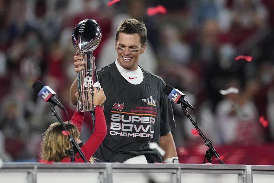 Tampa Bay Buccaneers quarterback Tom Brady holds up the Vince Lombardi trophy after defeating the Kansas City Chiefs in the NFL Super Bowl 55 football game Sunday, Feb. 7, 2021, in Tampa, Fla. (AP Photo/Ashley Landis)