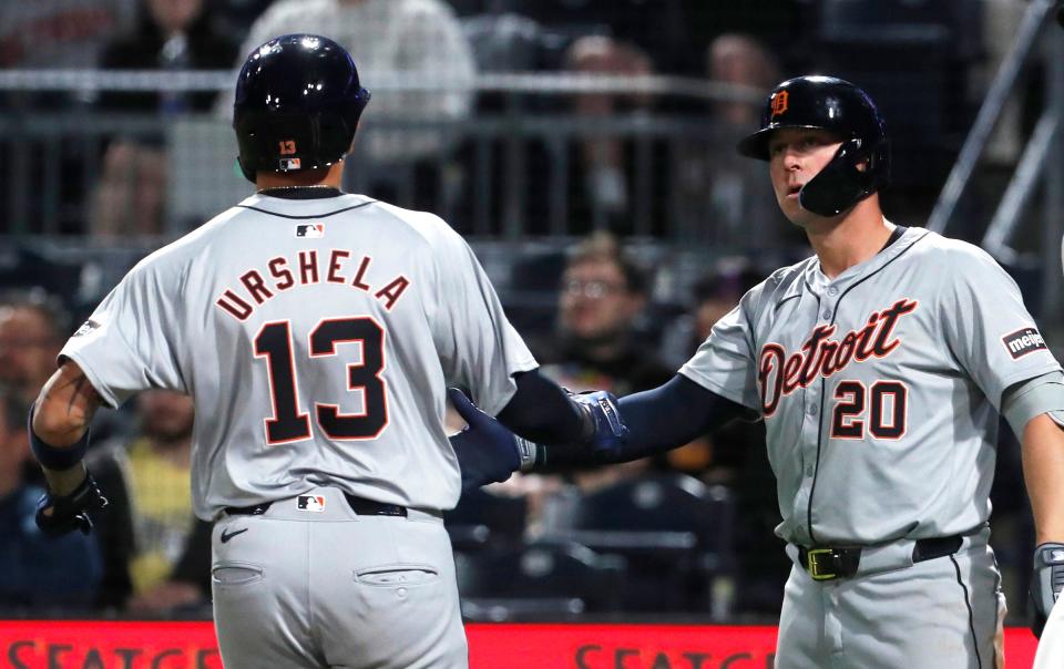 Tigers first baseman Spencer Torkelson greets third baseman Gio Urshela crossing home plate to score a run during the ninth inning of the Tigers' 7-4 loss to the Pirates on Monday, April 8, 2024, in Pittsburgh.