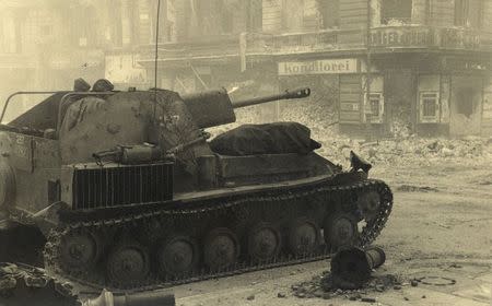 A Russian armoured vehicle is pictured at the junction between Ritter Street and Alexandrinen Street in this undated photo taken May 1945 in Berlin. REUTERS/MHM/Georgiy Samsonov/Handout via Reuters