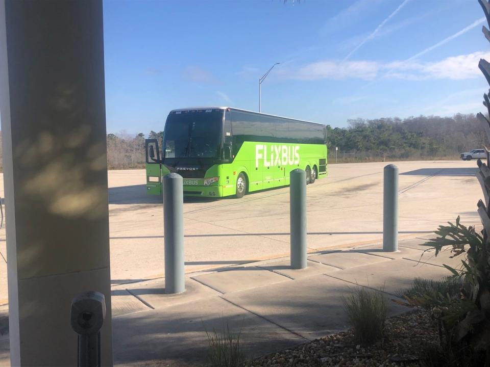 Green Flixbos parked at rest stop