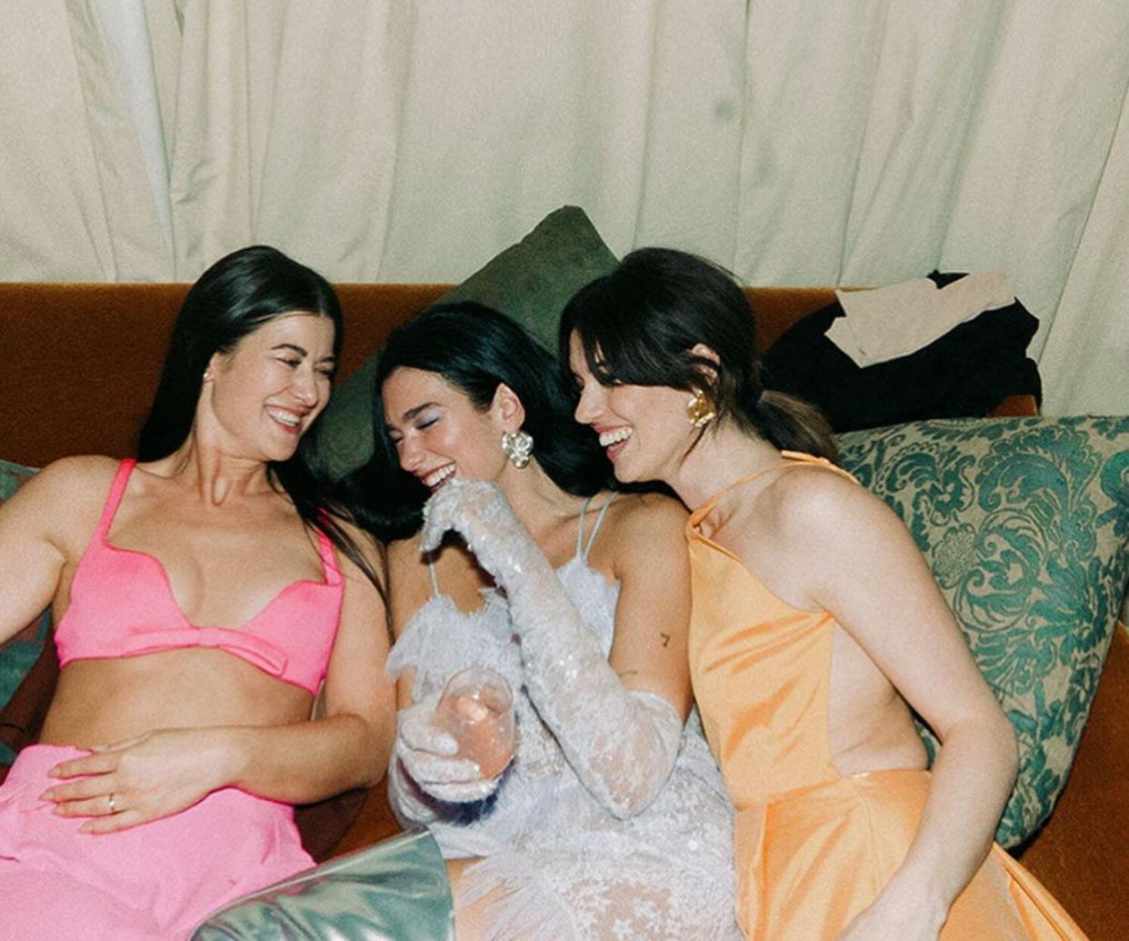 Dua Lipa Two Friends On Couch Instagram Wedding Guest