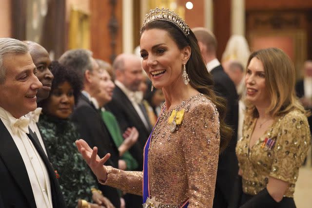 <p>Jonathan Brady/Pool via AP</p> Kate Middleton at an evening reception for members of the Diplomatic Corps at Buckingham Palace on Dec. 5, 2023.