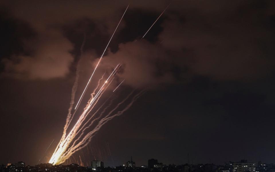 A salvo of rockets is fired from Gaza City toward Israel - MOHAMMED ABED 