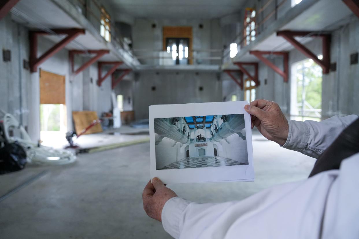 Mike Freeman shows what the Great Hall will look like once it's completed at the end of 2024.