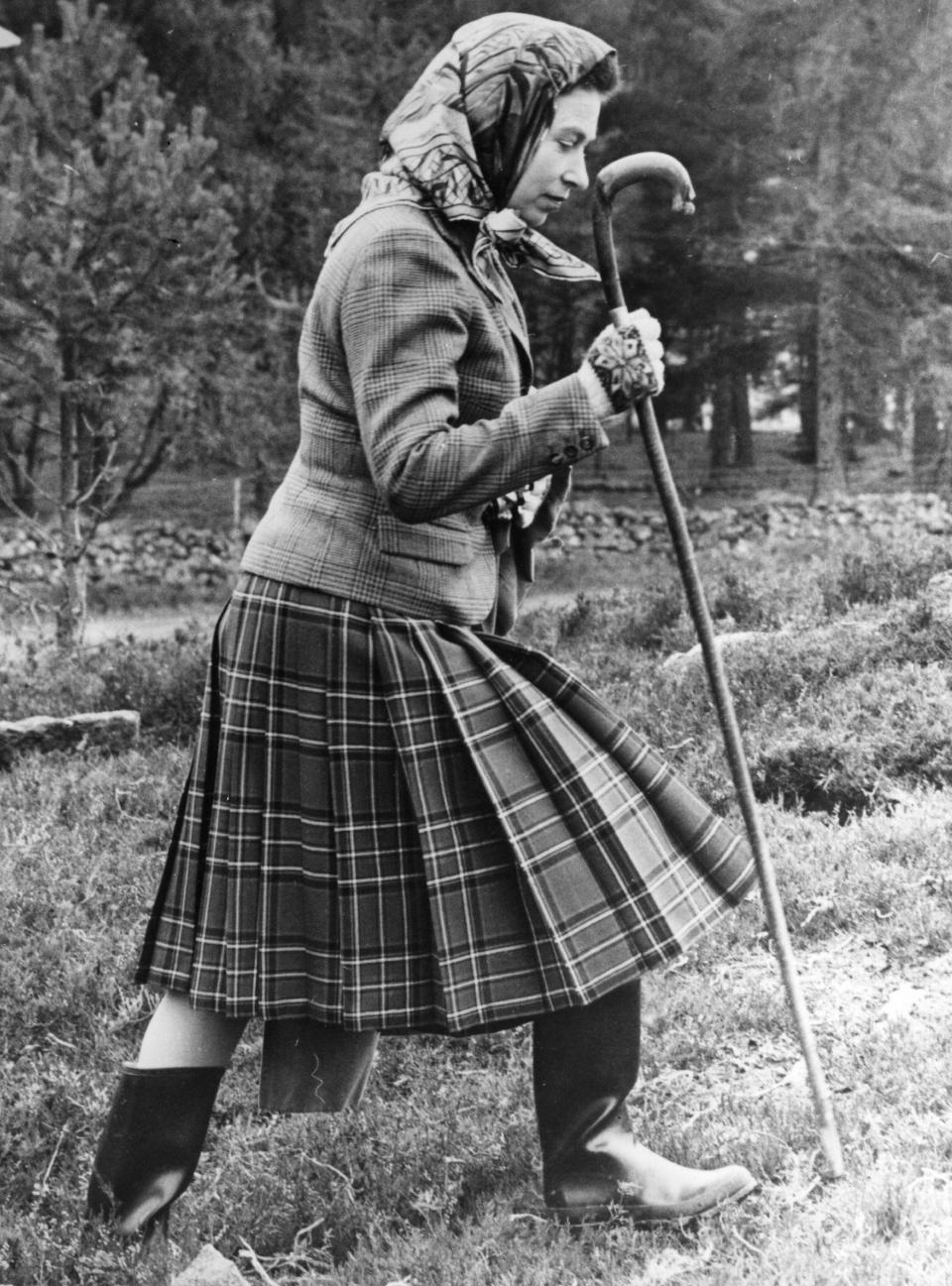 6th October 1967: Queen Elizabeth II walking cross country at the North of Scotland Gun Dog Association Open Stake Retreiver Trials in the grounds of Balmoral Castle. (Photo by Central Press/Getty Images)