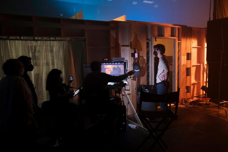 Richard Jane watches the monitor as a scene is shot at Green Pastures Studio.