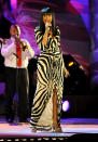 Jennifer Hudson has been on an inspirational weight loss journey for nearly two years and, needless to say, her determination has paid off. Wearing a zebra-print Roberto Cavalli gown, the multi-talented entertainer looked better than ever last week when she hit the stage to perform alongside the Boston Pops. Nude peep-toe sandals, blunt bangs, and barely-there makeup completed JHud's flawless ensemble. (7/3/2012)<br><br><a href="http://bit.ly/lifeontheMlist" rel="nofollow noopener" target="_blank" data-ylk="slk:Follow 2 Hot 2 Handle creator, Matt Whitfield, on Twitter!;elm:context_link;itc:0;sec:content-canvas" class="link ">Follow 2 Hot 2 Handle creator, Matt Whitfield, on Twitter!</a>