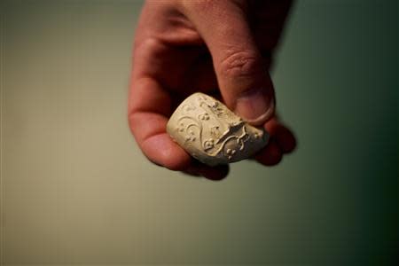 Fragments of a clay pipe is exhibited at the museum of Duffy's Cut at Immaculata College in Malvern, Pennsylvania on March 8, 2014. REUTERS/Mark Makela