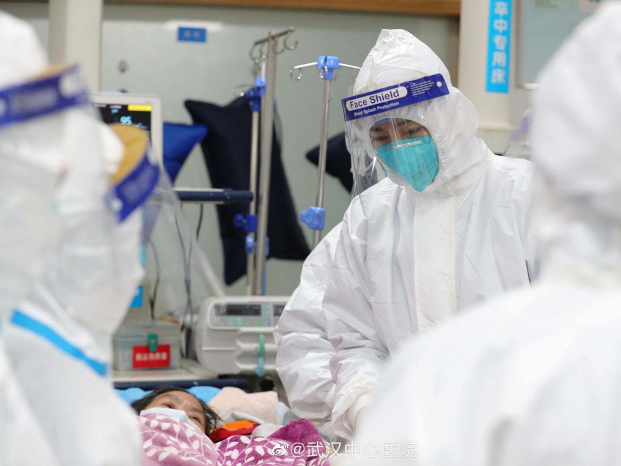 Medical staff attend to a patient at a hospital in Wuhan, China: THE CENTRAL HOSPITAL OF WUHAN via REUTERS