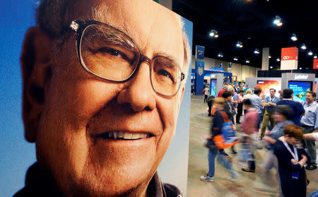 FILE PHOTO: Shareholders walk through the exhibit hall at the Berkshire Hathaway Inc annual meeting, the largest in corporate America, in its hometown of Omaha, Nebraska, U.S., May 4, 2018. REUTERS/Rick Wilking/File Photo