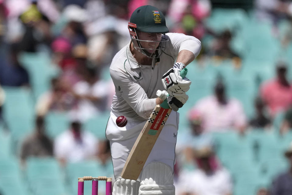 South Africa's Simon Harmer bats against Australia during the fifth day of their cricket test match at the Sydney Cricket Ground in Sydney, Sunday, Jan. 8, 2023. (AP Photo/Rick Rycroft)