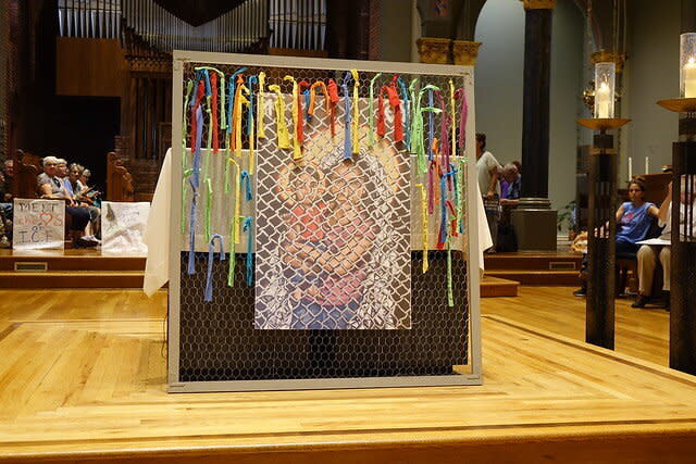 Kelly Latimore's icon is titled "Mother of God: Protectress of the Oppressed." It is seen here in front of the altar at&nbsp;St. Mary&rsquo;s Church in Newark. (Photo: Ignatian Solidarity Network)