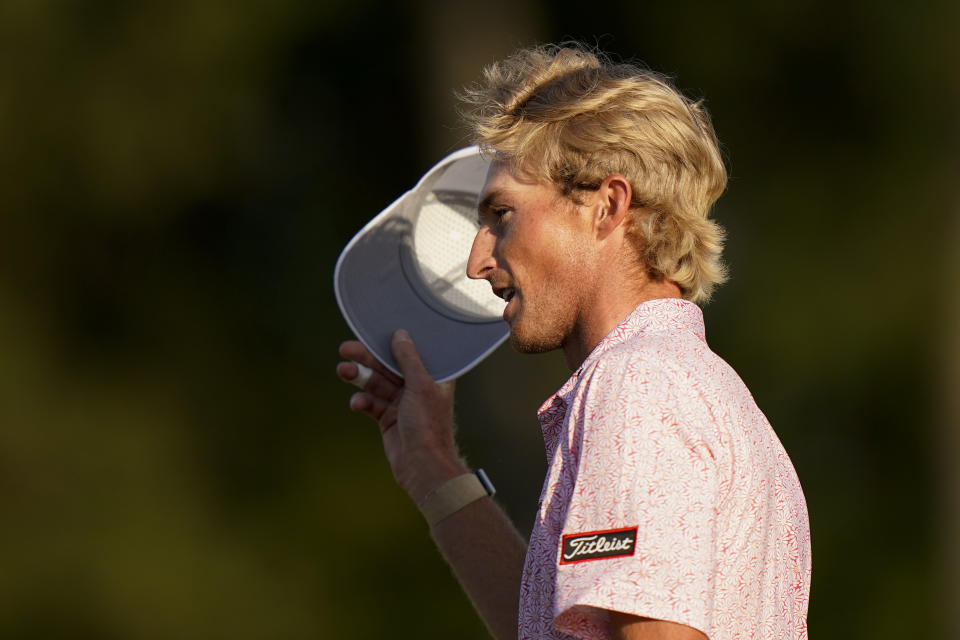 Will Zalatoris tips his cap after putting on the 18th hole during the final round of the Masters golf tournament on Sunday, April 11, 2021, in Augusta, Ga. (AP Photo/Matt Slocum)