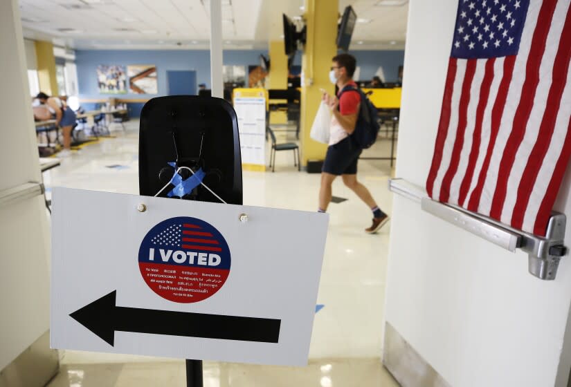 LOS ANGELES, CA - SEPTEMBER 14: Students, staff and nearby residents cast their ballots at UCLA Ackerman Union as polls were open Tuesday for Californians to decide whether Gov. Gavin Newsom should be removed from office and, if so, who should replace him in a recall election. UCLA on Tuesday, Sept. 14, 2021 in Los Angeles, CA. (Al Seib / Los Angeles Times).