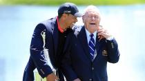 Palmer alongside Tiger Woods in 2013.