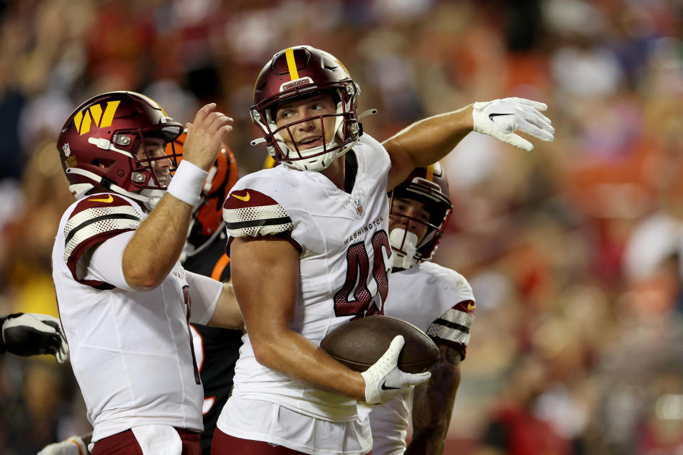 Tight end Brandon Dillon #46 of the Washington Commanders celebrates after catching a second half touchdown pass. (Photo by Rob Carr/Getty Images)